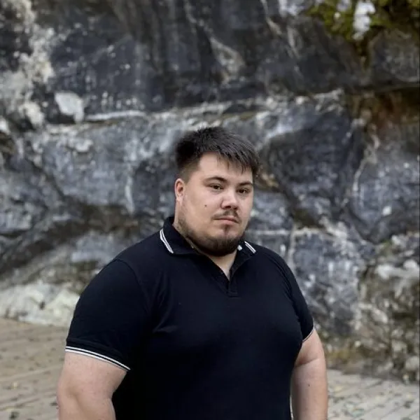Николай
